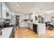 Spacious kitchen with breakfast bar and ample counter space at 6132 Terry Ct, Arvada, CO 80403