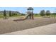 Community playground featuring a slide, climbing structure, and swings for enjoyment at 6132 Terry Ct, Arvada, CO 80403