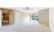 Generously sized bedroom with plush carpet and a large window for natural light at 9845 Keenan St, Highlands Ranch, CO 80130