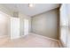 Cozy bedroom with a neutral palette, plush carpeting, and ample natural light at 9845 Keenan St, Highlands Ranch, CO 80130