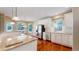 Modern kitchen with granite countertops, stainless steel appliances, and ample natural light from the windows at 9845 Keenan St, Highlands Ranch, CO 80130