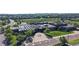 Modern school building featuring solar panels, well-kept grounds, and accessibility parking at 9845 Keenan St, Highlands Ranch, CO 80130