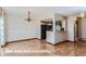 Cozy dining room adjacent to the kitchen area with hardwood floors at 11612 E Cornell Cir, Aurora, CO 80014