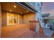 Inviting outdoor back deck with wooden railing, offering a relaxing space for entertaining and enjoying the scenery at 12953 Bridge View Ln, Parker, CO 80134