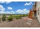 Backyard with an inviting staircase and landscaping to enjoy the outdoor views at 12953 Bridge View Ln, Parker, CO 80134