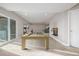 Basement featuring a pool table, carpeted floors, and slider door access to the exterior with an exercise space at 12953 Bridge View Ln, Parker, CO 80134