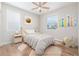 Cozy bedroom with neutral tones, a soft rug, and ample natural light for a comfortable feel at 12953 Bridge View Ln, Parker, CO 80134