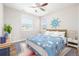 Charming bedroom with whimsical decor, large windows, and playful accents for a delightful atmosphere at 12953 Bridge View Ln, Parker, CO 80134