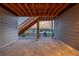 View from the covered patio showcases stairs above and open surroundings at 12953 Bridge View Ln, Parker, CO 80134