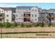 Exterior of home showing wooden staircase and back deck at 12953 Bridge View Ln, Parker, CO 80134
