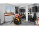 Eclectic bedroom featuring a drum set, music decor, and natural light at 902 Pacific Pl, Fort Lupton, CO 80621