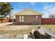 Charming single-story brick home with a well-maintained front yard and cozy curb appeal at 902 Pacific Pl, Fort Lupton, CO 80621