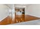 Open-concept area with views of the kitchen, dining, and living spaces at 6000 W Floyd Ave # 116, Denver, CO 80227