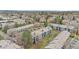 Scenic aerial view of the community and surrounding lush greenery at 3656 S Depew St # 102, Denver, CO 80235