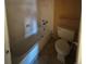 Bathroom featuring a white tub, toilet, tile flooring, and neutral-painted walls at 1021 Downing Way, Denver, CO 80229