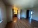 Spacious main bedroom with hardwood flooring and en-suite bathroom at 1021 Downing Way, Denver, CO 80229