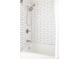 Clean bathroom with white subway tile shower/tub combo at 5604 S Yakima Way, Aurora, CO 80015