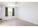 Bright bedroom with neutral walls and carpeting at 5604 S Yakima Way, Aurora, CO 80015