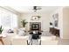 Living room with fireplace and plenty of natural light at 5604 S Yakima Way, Aurora, CO 80015