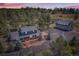 Expansive property featuring a two-story home with a detached garage and scenic treed landscape at 12454 Antelope Trl, Parker, CO 80138