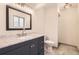 Renovated bathroom features granite counters, a sleek vanity, and a tiled walk-in shower at 12454 Antelope Trl, Parker, CO 80138