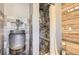 Unique bathroom featuring a beer-keg urinal and beautifully tiled shower at 12454 Antelope Trl, Parker, CO 80138
