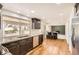 Spacious kitchen featuring granite countertops, stainless steel appliances, and an island with seating for casual dining at 12454 Antelope Trl, Parker, CO 80138