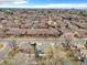 An aerial view showcases a well-planned neighborhood with uniform architecture and convenient street access at 2455 E Yale Ave, Denver, CO 80210