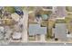 Aerial view of a single Gathering home with a fenced backyard and trampoline at 2455 E Yale Ave, Denver, CO 80210
