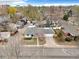 Charming single-story home with well-maintained lawn, mature landscaping and attached two-car garage at 2455 E Yale Ave, Denver, CO 80210