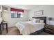 This cozy bedroom has modern decor and a spacious layout at 4970 S Chester St, Greenwood Village, CO 80111