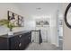 The second floor hallway has stylish decor and neutral colors at 4970 S Chester St, Greenwood Village, CO 80111