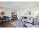 Comfortable living room featuring stylish decor, hardwood floors, and neutral colors at 4970 S Chester St, Greenwood Village, CO 80111