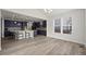 An open-concept design seamlessly blends the kitchen and dining area, offering ample space for entertaining at 6220 Waterman Way, Frederick, CO 80516