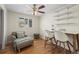 Cozy office with hardwood floors, ceiling fan, natural light, and built-in shelves at 421 Iola St, Aurora, CO 80010