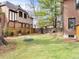 Large grassy backyard perfect for entertaining with a unique blue swing at 1944 Hudson St, Denver, CO 80220