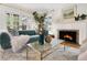 Comfortable living room with fireplace and lots of natural light at 1944 Hudson St, Denver, CO 80220
