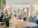 Bright living room viewed from the dining room at 1944 Hudson St, Denver, CO 80220