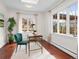 Inviting home office with plenty of natural light and comfortable seating at 1944 Hudson St, Denver, CO 80220
