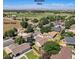 Great aerial image of the area showcasing a mountain view and the open field nearby at 1030 S Fulton Ave, Fort Lupton, CO 80621