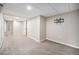 Spacious finished basement with neutral walls and carpet flooring, ready for customization at 1030 S Fulton Ave, Fort Lupton, CO 80621