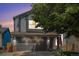 Charming two-story home with gray siding, stone accents, and a well-maintained front yard at 2782 S Ceylon St, Aurora, CO 80013