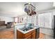 View of the kitchen and living area, showing an open concept layout at 2782 S Ceylon St, Aurora, CO 80013