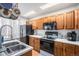 Bright kitchen with stainless steel appliances and ample cabinet space at 2782 S Ceylon St, Aurora, CO 80013