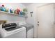 Functional laundry room with modern washer and dryer at 2782 S Ceylon St, Aurora, CO 80013