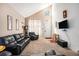 Inviting living room with high ceilings, natural light, and a cozy seating area at 2782 S Ceylon St, Aurora, CO 80013