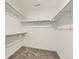 Walk-in closet with built-in shelving, providing ample storage space at 11030 Snowdon St, Parker, CO 80134