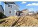 Backyard featuring a pergola with room for dining and a well-maintained lawn at 1027 Koss St, Erie, CO 80516