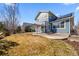 Backyard featuring a pergola with room for dining and a well-maintained lawn at 1027 Koss St, Erie, CO 80516