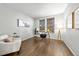 Bright home office featuring hardwood floors and a serene workspace at 1027 Koss St, Erie, CO 80516